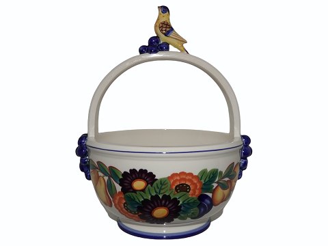 Golden Summer
Fruit bowl with handle and bird figurine