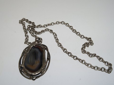 Anette BordLarge pendant with stone in long chain from 1970-1980