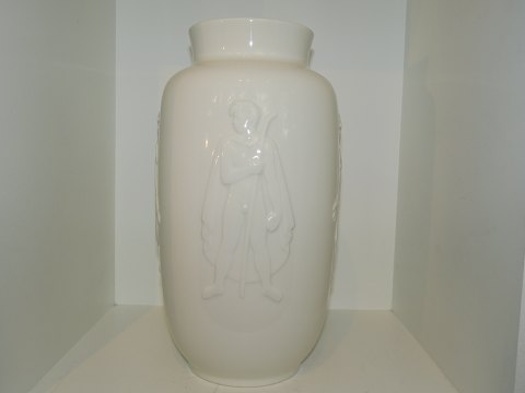 Royal Copenhagen
Stor hvid vase med fire menneske dekorationer fra 1956