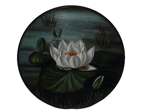 Ipsen Art Pottery 
Black plate with water lilly