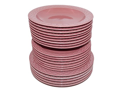 Palet
Samling lyserøde tallerkner