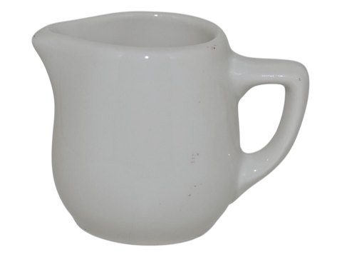 Royal Copenhagen
Miniature hvid flødekande i jernporcelæn 4,2 cm.
