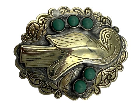 Stor broche med fugl og fem sten