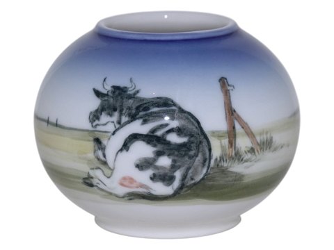 Royal CopenhagenSmall unique vase with black and white cow lying in field