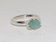 Sterling silverSpinning ring with light green stone May Size 52