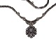 14 carat white gold necklace with pendant containing 16 diamonds