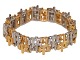 Michelsen 18 karat guld 
Kraftigt og bredt brutalisme armbånd af Knud V. Andersen fra 1975-1989