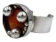 Jacob HullBangle with large orange center from 1960-1970