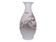 Royal CopenhagenLarge vase featuring a large tree by the water and a flying bird from 1923–1928.